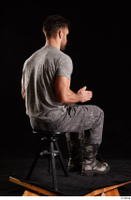  Larry Steel  1 boots dressed grey camo trousers grey t shirt shoes sitting whole body 0012.jpg